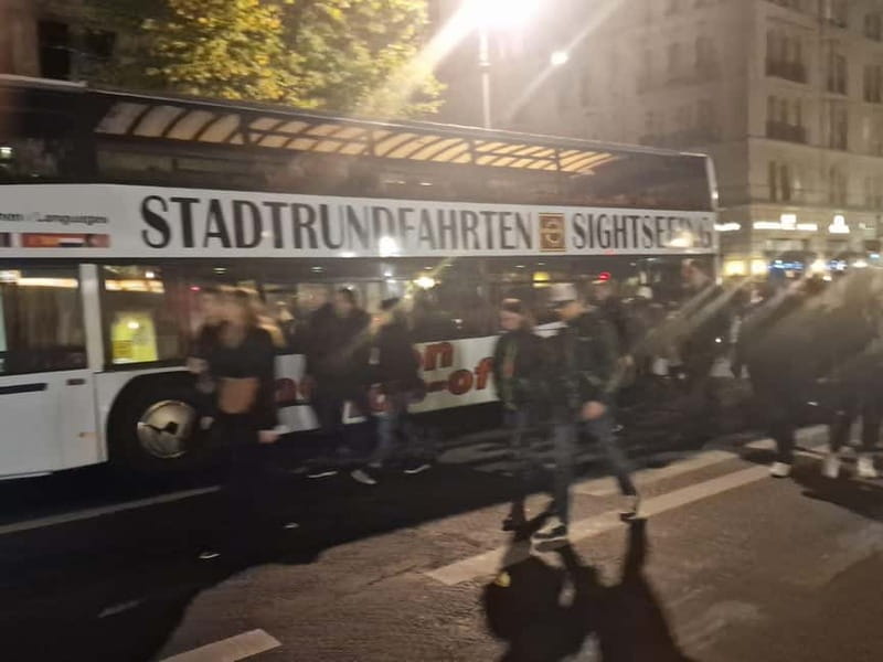 Berlin: Bus Tour by Night with Live Commentary - Alexanderplatz and its glowing landmarks