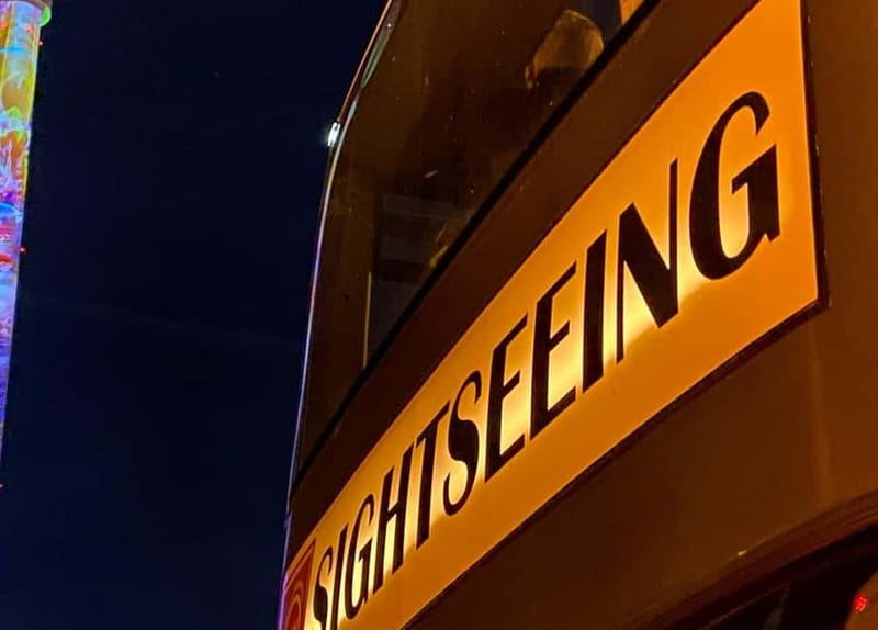 Berlin: Bus Tour by Night with Live Commentary - Open-top comfort, cold weather, and taking photos