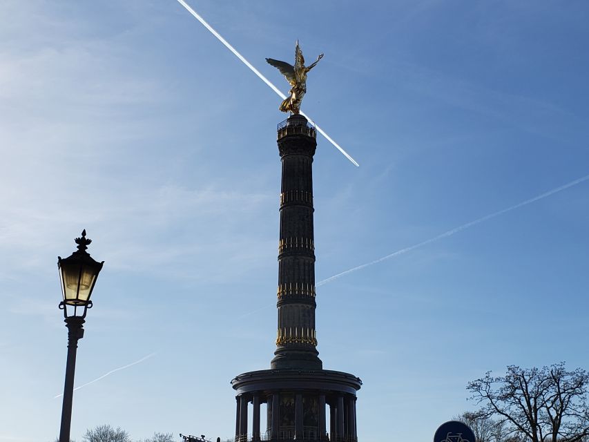Berlin: Highlights of the City - a Private Bus Tour - Walking through the Brandenburg Gate