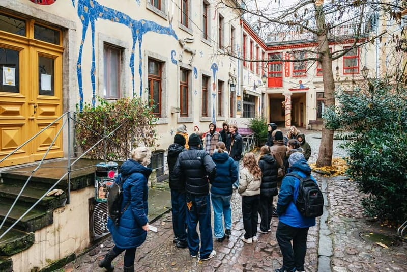 Dresden: Neustadt District Street Art Guided Walking Tour - Wilhelminian-era buildings beside modern street life