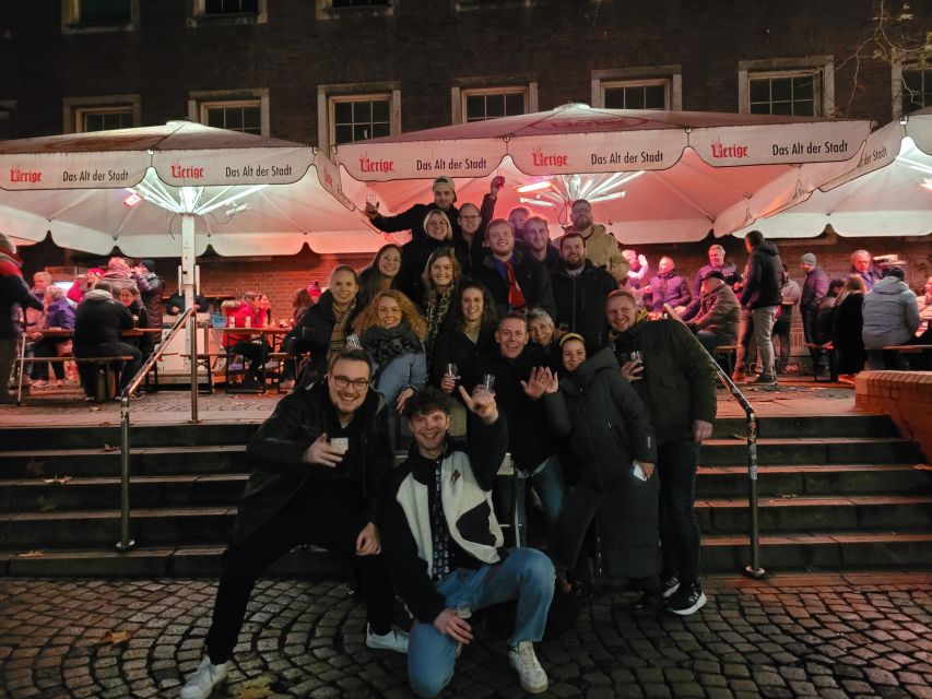 Düsseldorf: Guided Beer Tour with 4 Beers & a Flexible Route - Four bars, four glasses, and a moving introduction to Düsseldorf