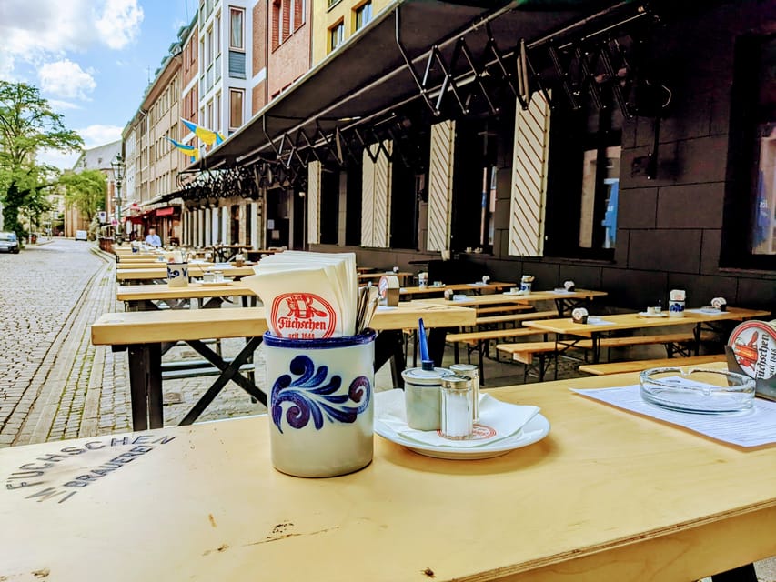 Düsseldorf: Tipping based - Old Town Walking Tour - From luxury shopping to Düsseldorf’s market