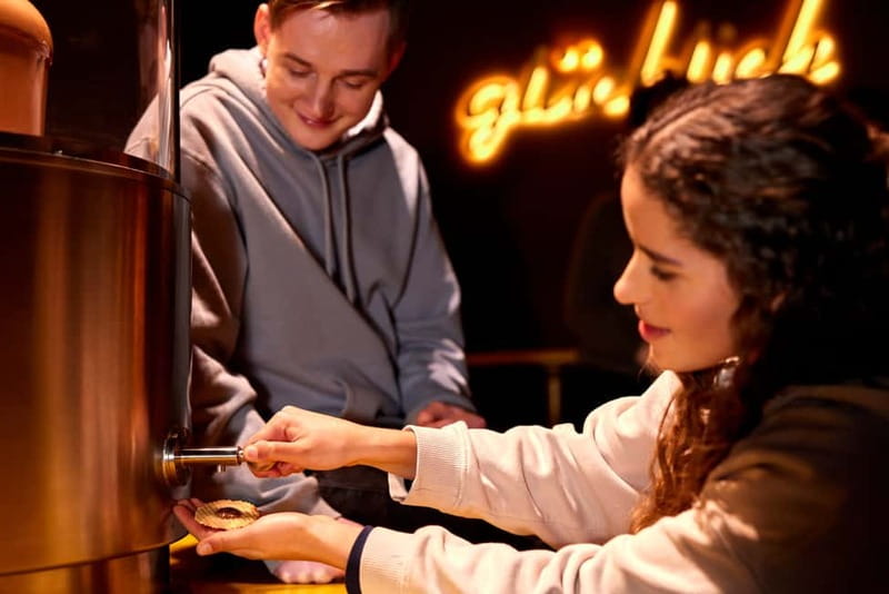 Hamburg: Chocoversum Guided Tour with Tastings - Making your own chocolate bar