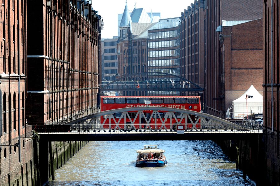 Hamburg Discovery: Bus Tour with Harbor & Alster Lake Cruise - St. Pauli Landungsbrücken puts the harbor within reach