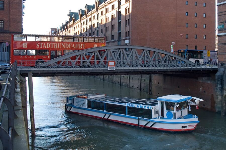 Hamburg: Harbor Cruise and Bus City Hop-On Hop-Off Tour - Seeing Speicherstadt from street level later