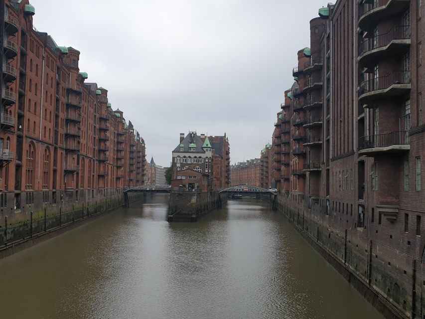 Hamburg: Speicherstadt Historical Guided Walking Tour - Beginning with brick, canals, and warehouse design