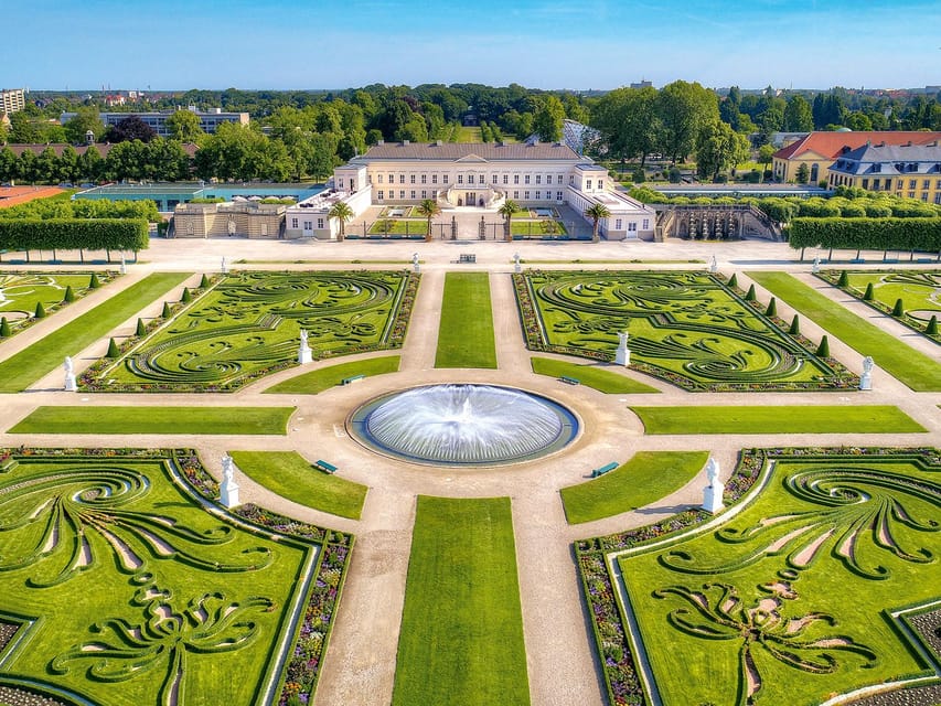 Hanover: Royal Gardens of Herrenhausen Guided Tour - The opening walk through a French-style garden
