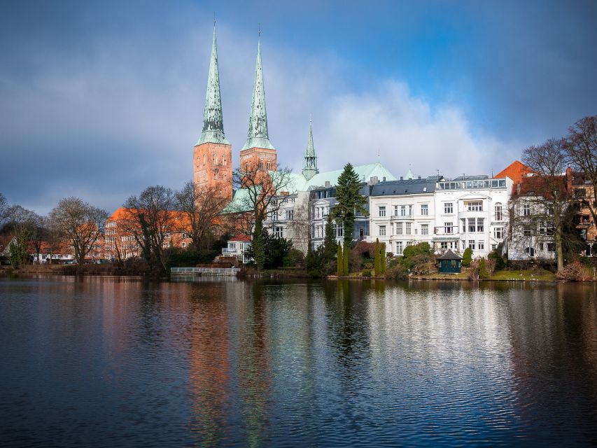 Lübeck: Old Town Highlights Private Walking Tour - The four-hour option enters Holstentor