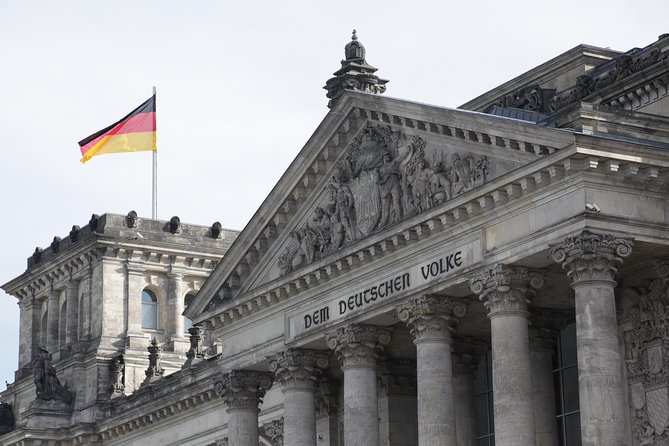 Private Walking Tour: Behind the Iron Curtain and Berlin Wall - Alexanderplatz brings the tour back to city life