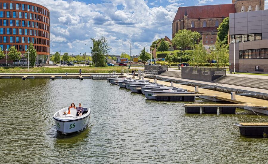 Rostock: Electric Boat Rental on the Warnow River - Safety, steering, and staff service