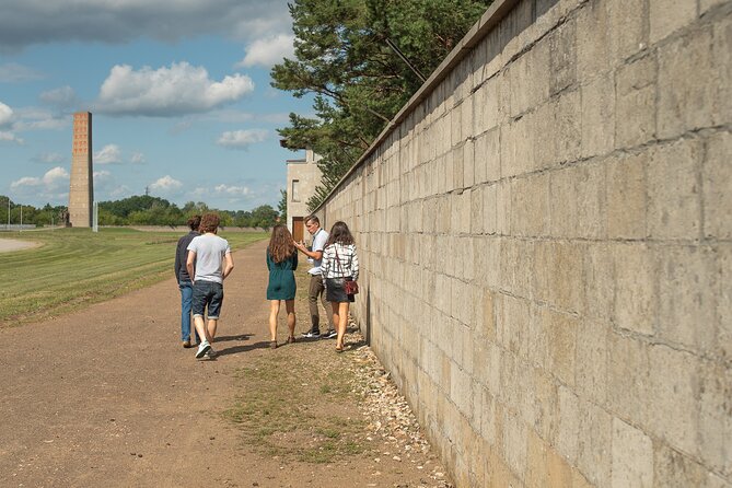 Sachsenhausen Concentration Camp Bus Tour in English from Berlin - Barracks, infirmary, and the human cost of the camp